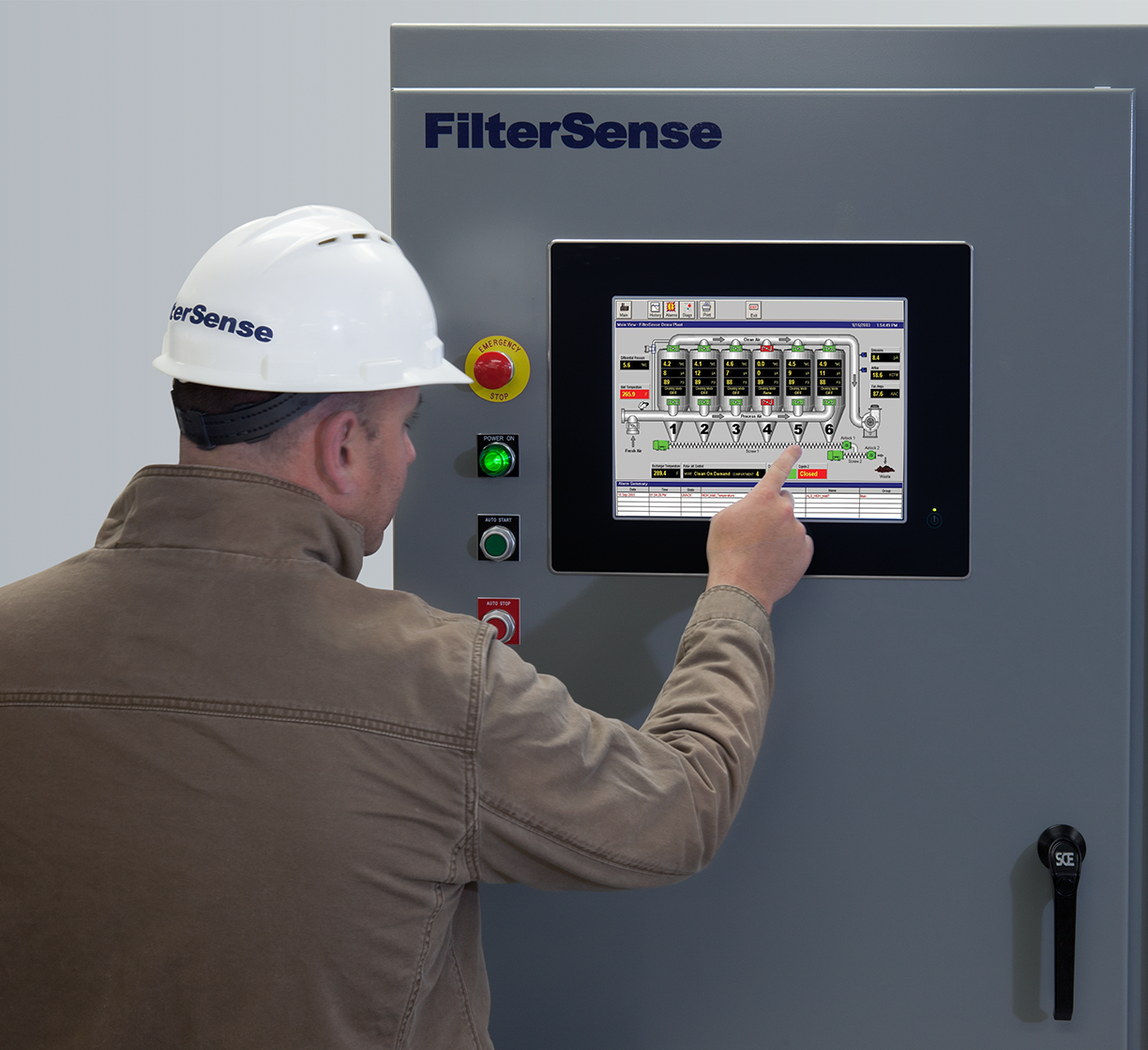 worker using FilterWARE on a control panel